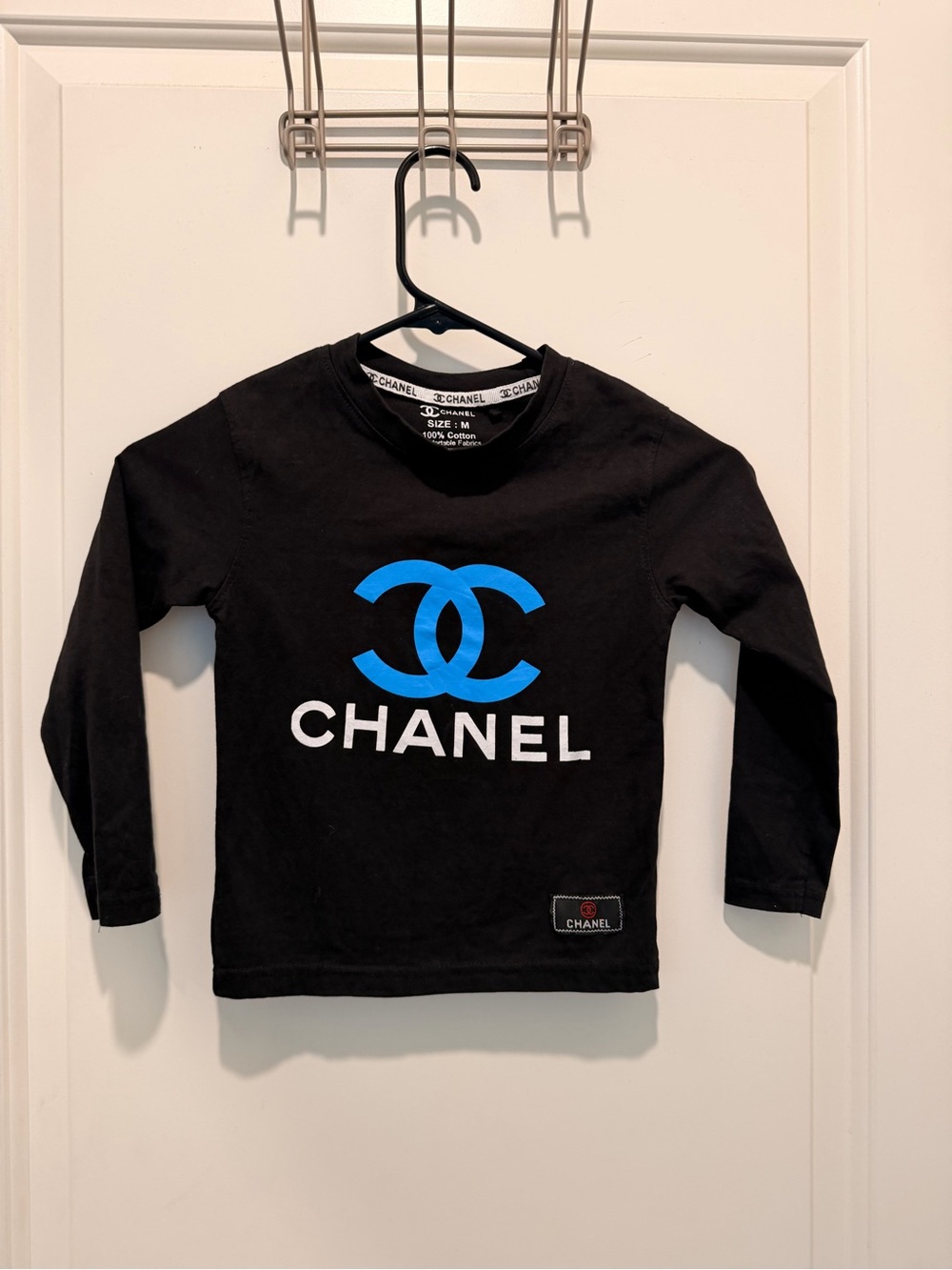 Chanel Black Long Sleeve T-Shirt with Blue and White
Logo Size M